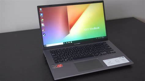 Pc portable vivobook (rayures capot)