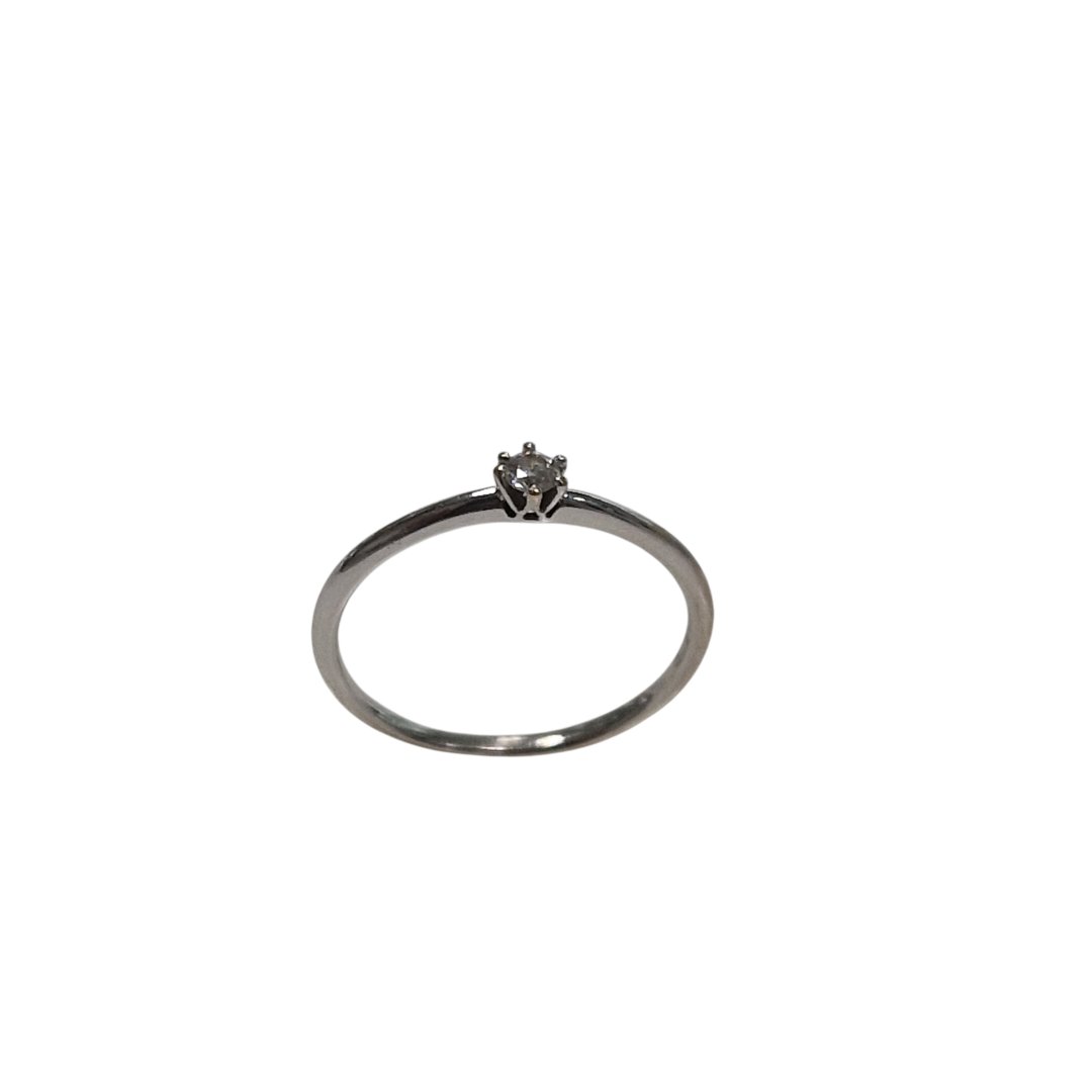 Bague blanc 1diamant environ 0.05ct