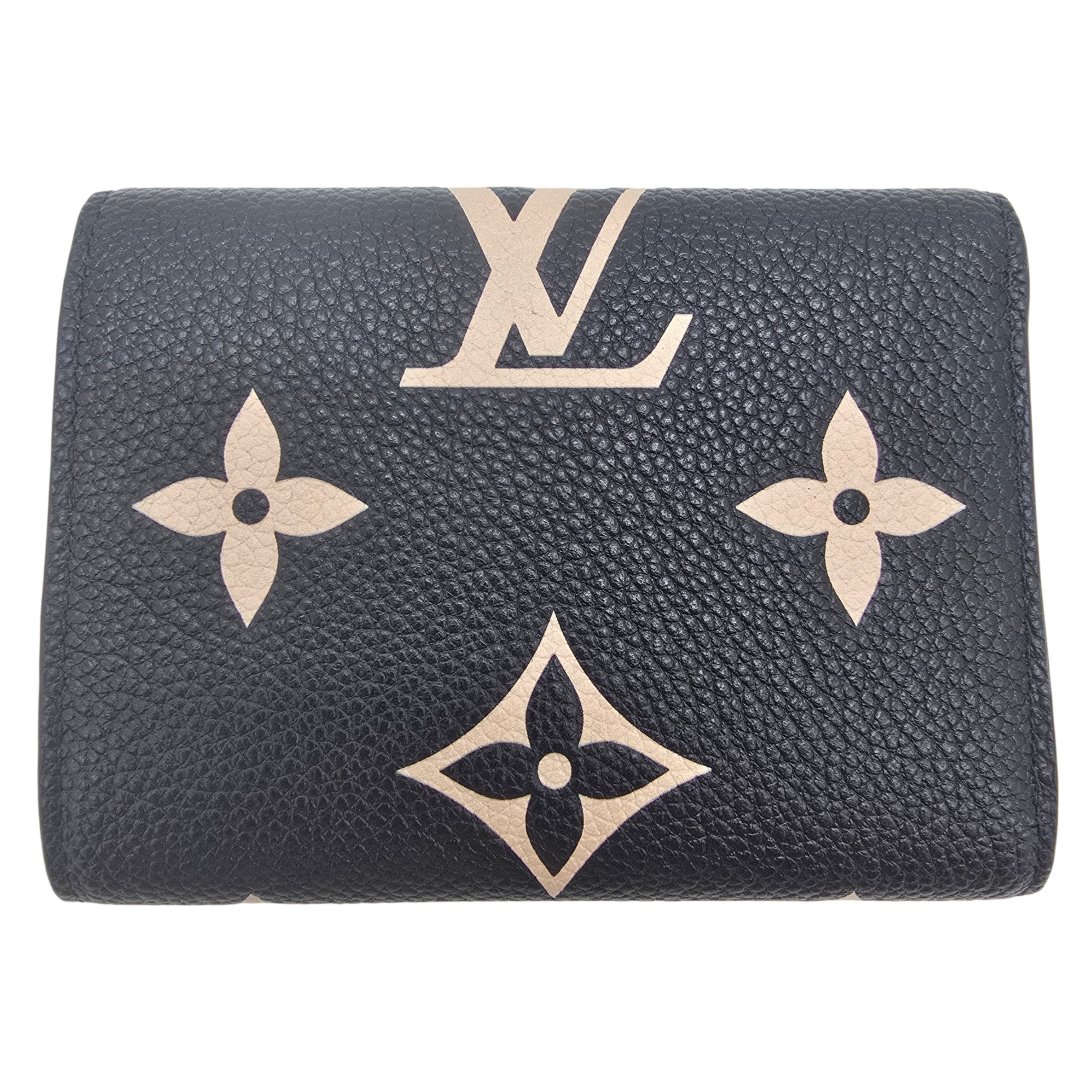 Portefeuille victorine cuir monogram empreinte bicolore noir/beige