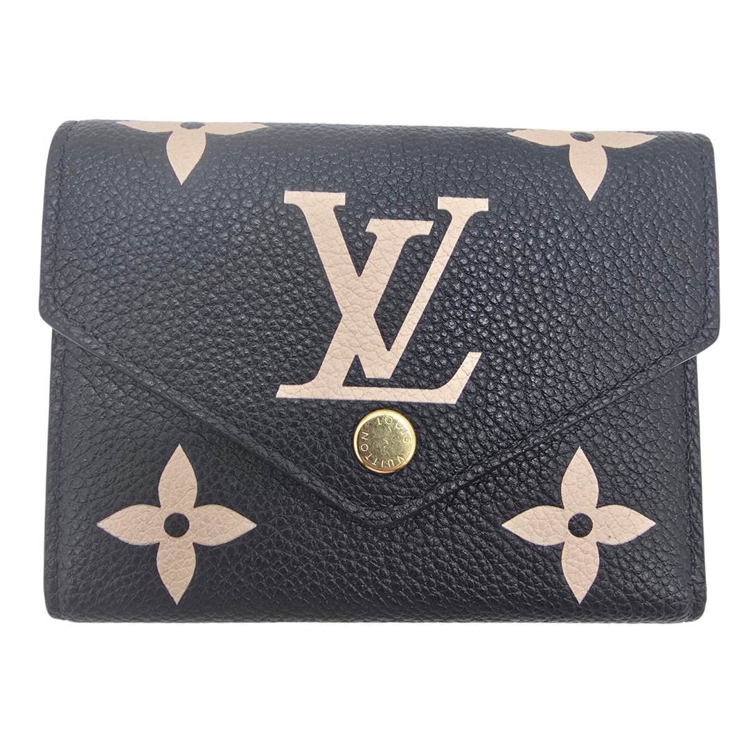 Portefeuille victorine cuir monogram empreinte bicolore noir/beige