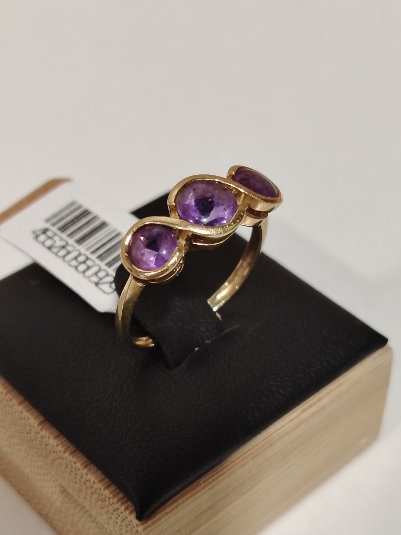 Bague jaune 3 pierre violette