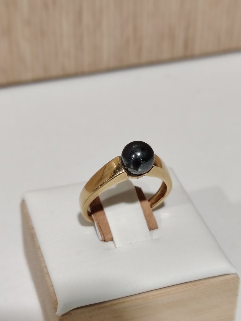 Bague jaune perle noire