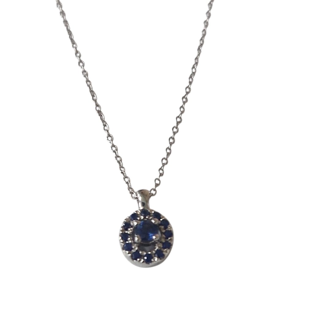 Collier mauboussin blanc pendentif serti pierres bleues